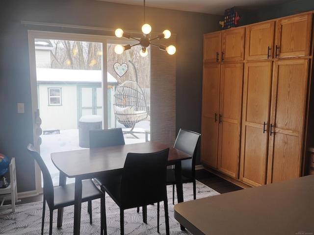 dining room with a notable chandelier