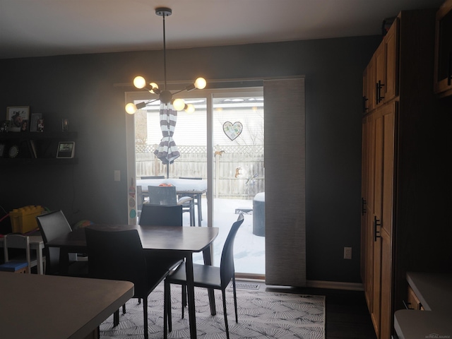 dining room with a chandelier