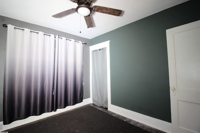 spare room with ceiling fan