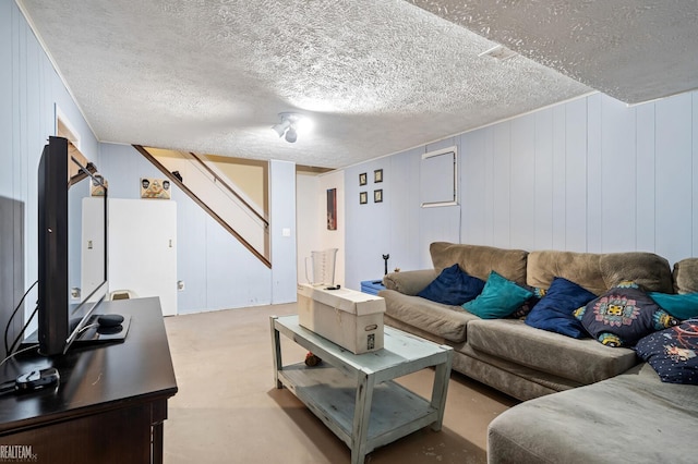 living room featuring a textured ceiling