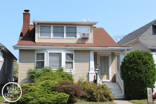 view of front of property featuring cooling unit