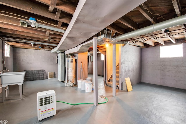 basement featuring gas water heater