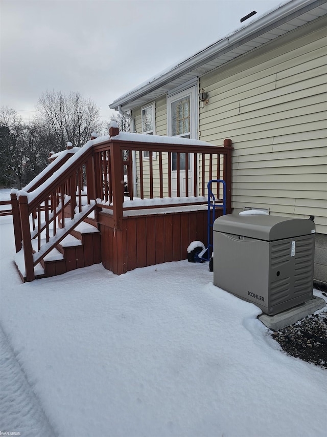 view of snow covered deck