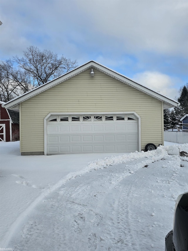 view of snow covered garage