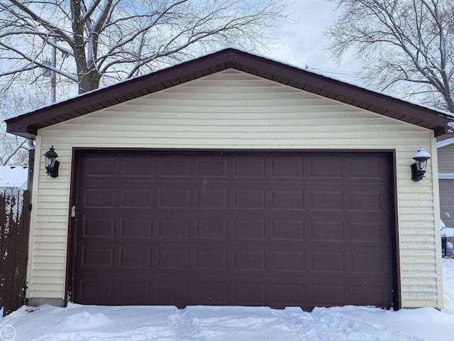 view of snow covered garage