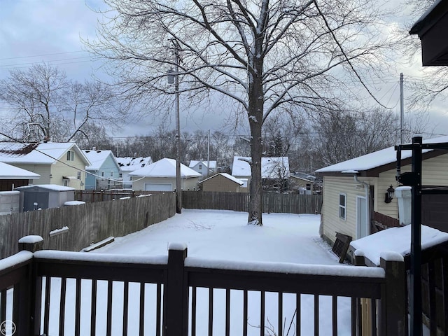 view of yard covered in snow