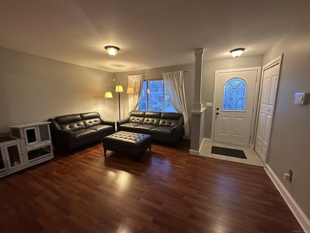 living room featuring dark hardwood / wood-style floors