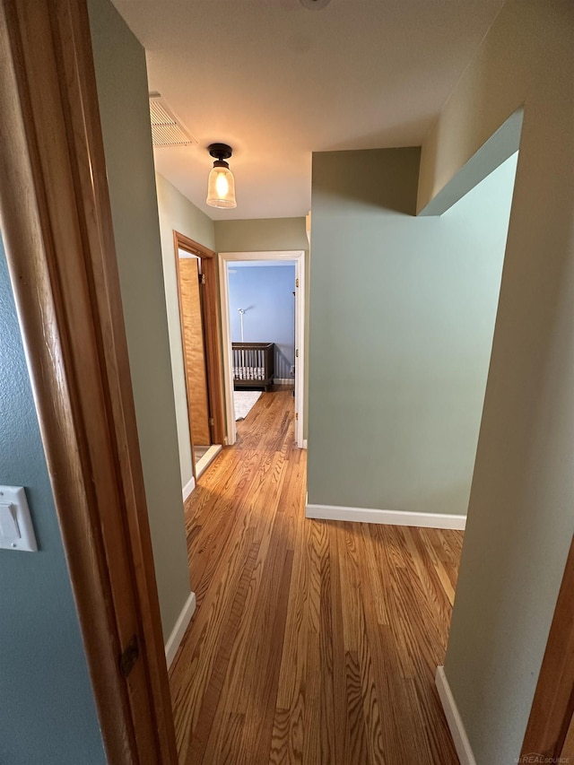 hall featuring light hardwood / wood-style flooring