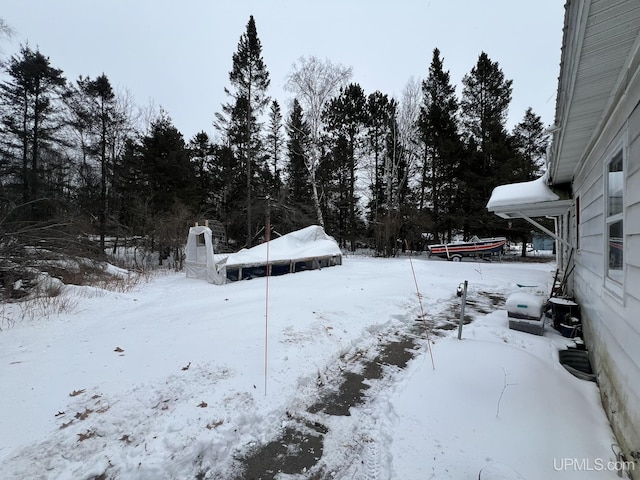 view of snowy yard