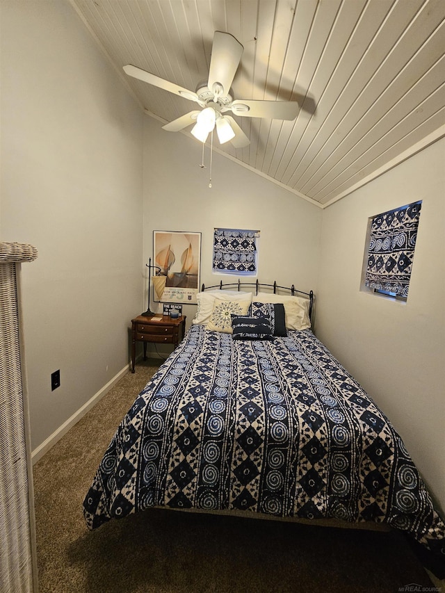 carpeted bedroom featuring vaulted ceiling, wooden ceiling, and ceiling fan