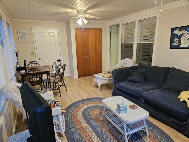 living room with ornamental molding, wooden ceiling, ceiling fan, and light hardwood / wood-style flooring