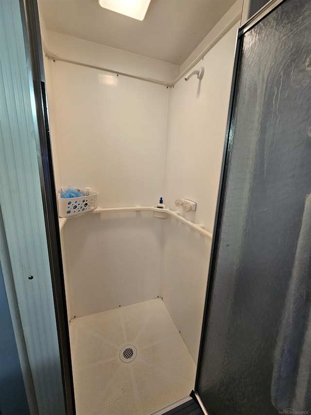 bathroom featuring walk in shower