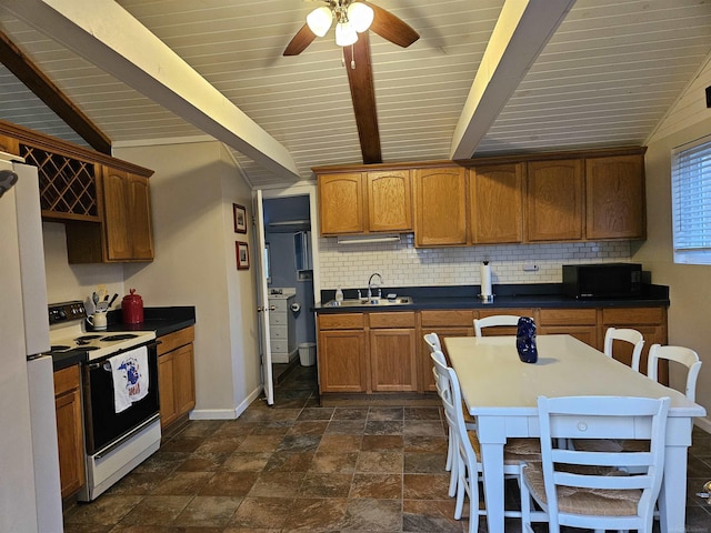 kitchen featuring white appliances, beam ceiling, sink, and backsplash