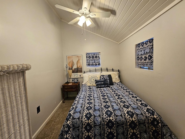 bedroom with ceiling fan, lofted ceiling, and carpet floors