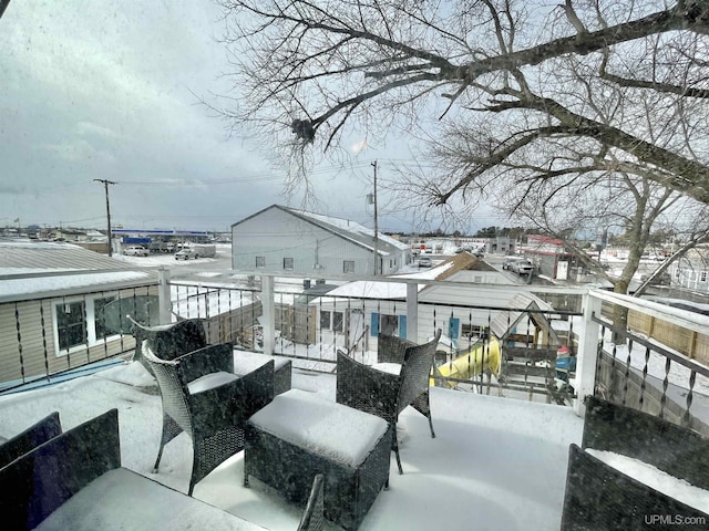 view of snow covered patio