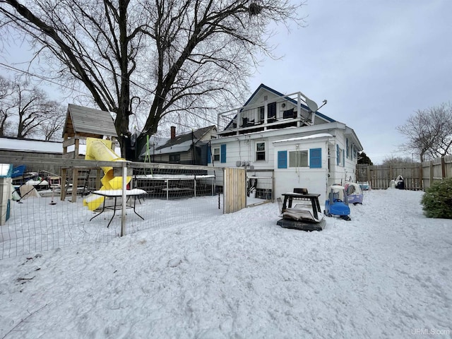 view of snow covered property