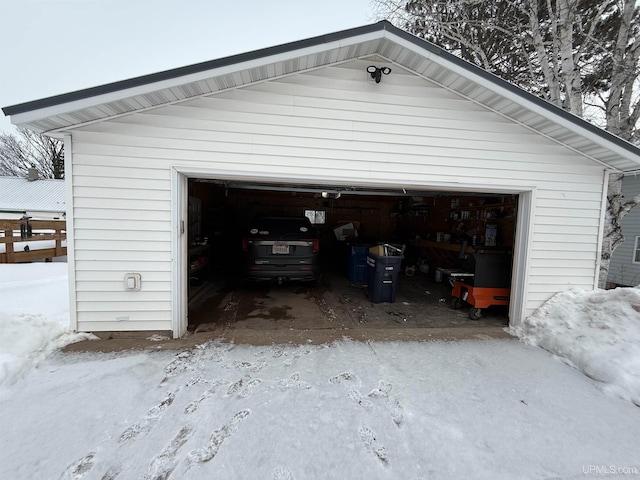 view of snow covered garage