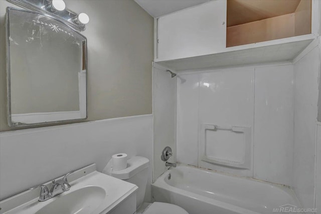 full bathroom with shower / tub combination, vanity, and toilet