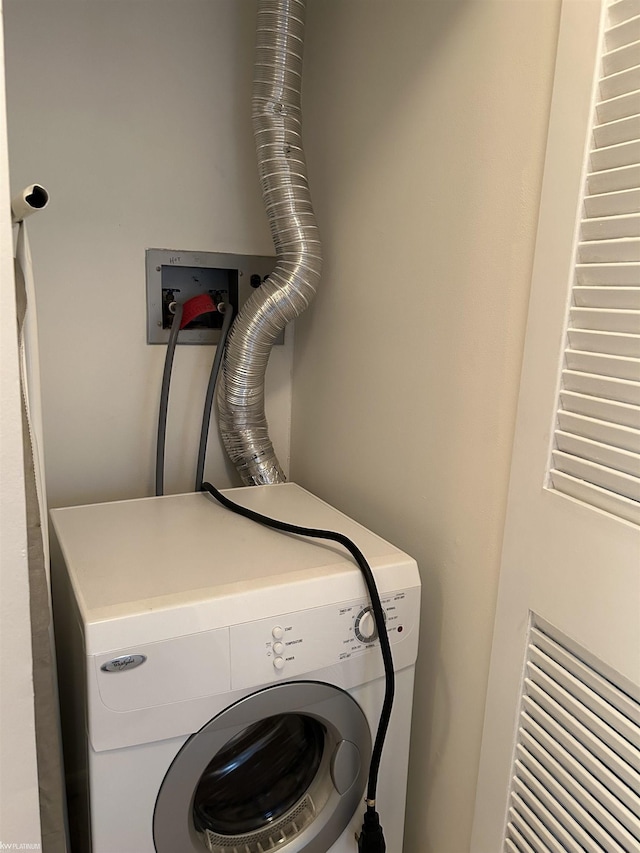 laundry room with washer / clothes dryer