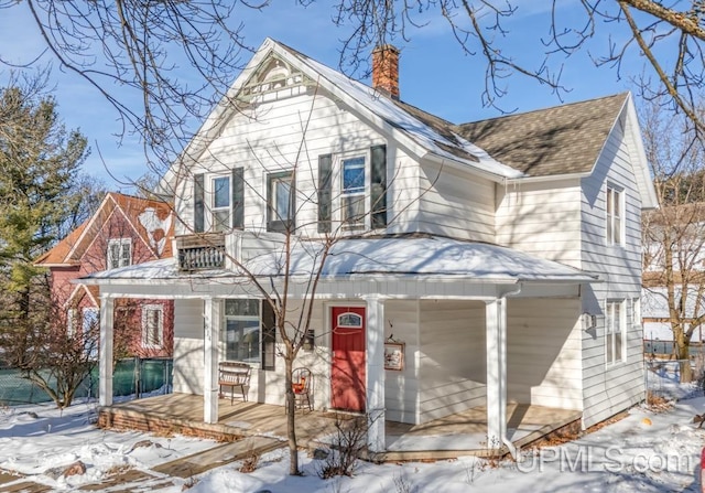 view of front of property featuring covered porch