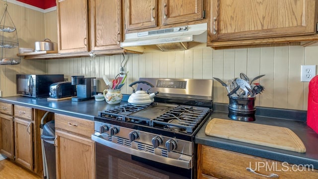 kitchen featuring stainless steel gas range