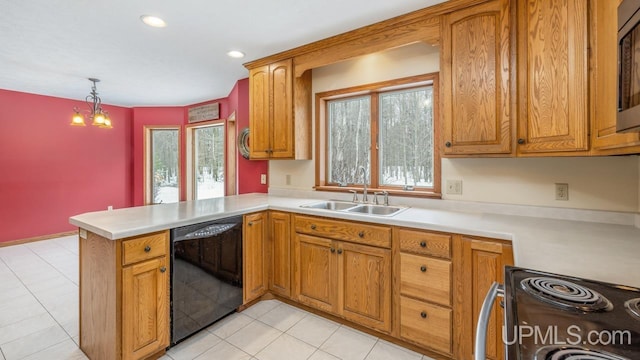 kitchen featuring sink, decorative light fixtures, electric range, dishwasher, and kitchen peninsula