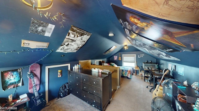 interior space with light colored carpet and vaulted ceiling