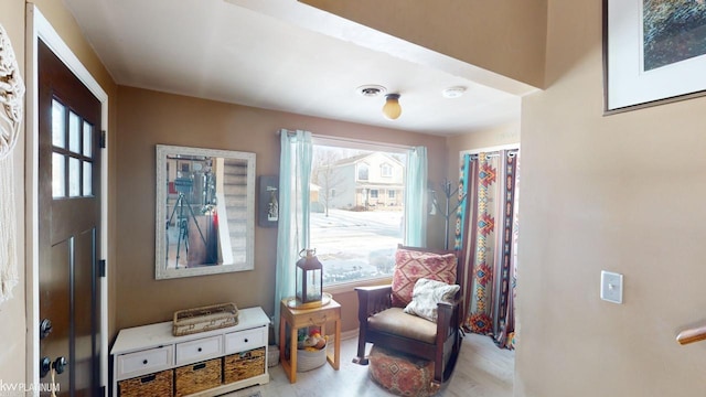 sitting room featuring a wealth of natural light