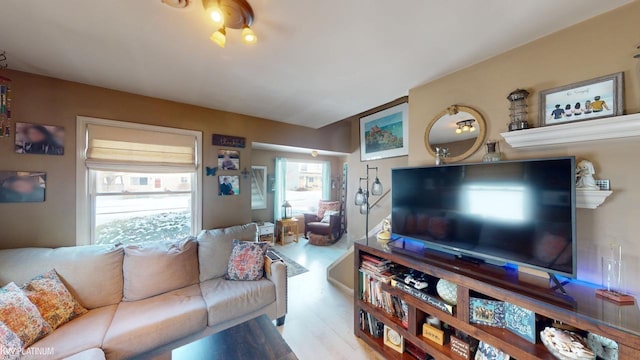 living room with light hardwood / wood-style flooring