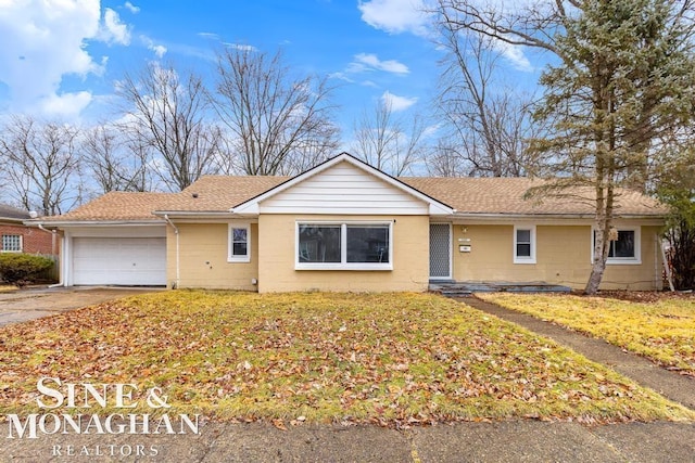 single story home with a garage