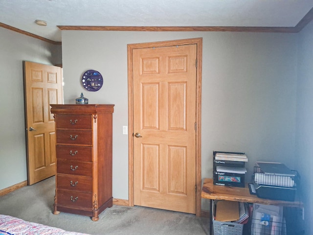 carpeted bedroom with crown molding