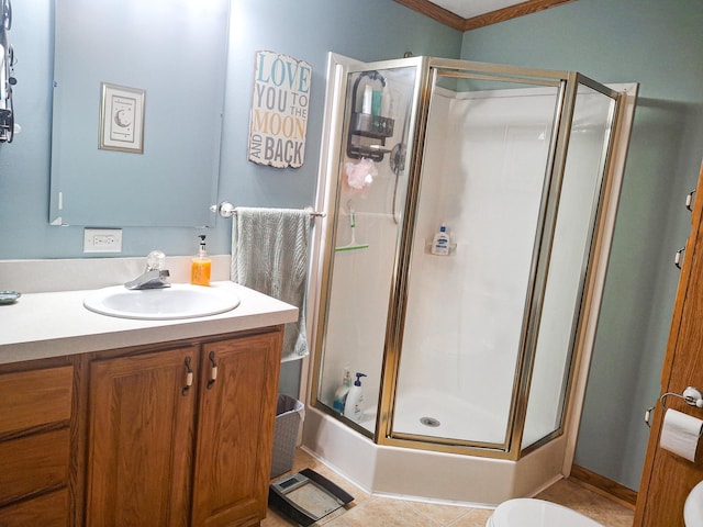 bathroom with vanity, tile patterned floors, and walk in shower