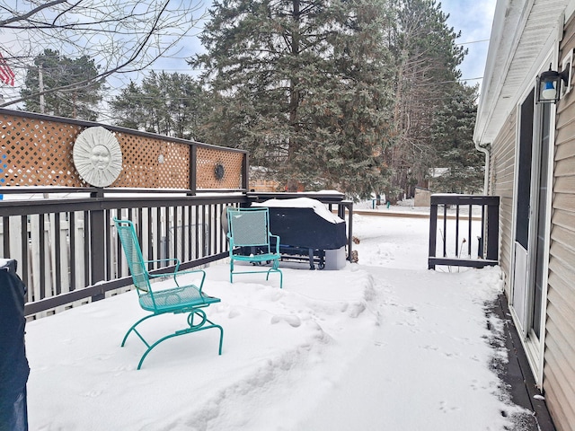 view of snow covered deck