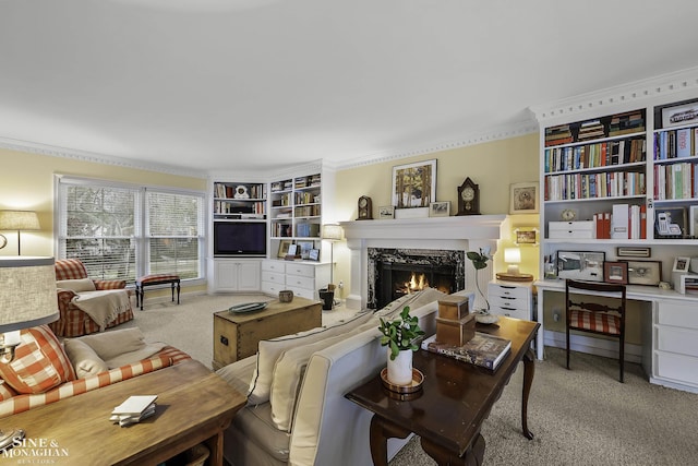 carpeted living room with crown molding and a high end fireplace