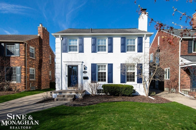 colonial house with a front yard