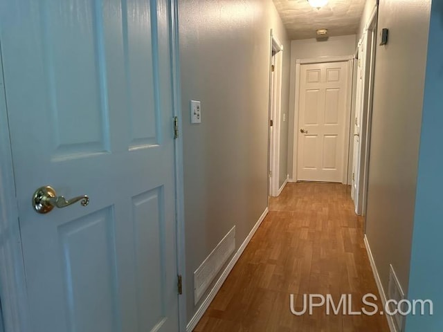 hall featuring hardwood / wood-style floors