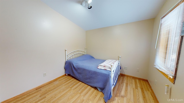 bedroom with light wood-type flooring