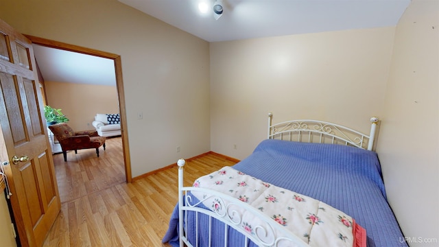 bedroom with light hardwood / wood-style flooring