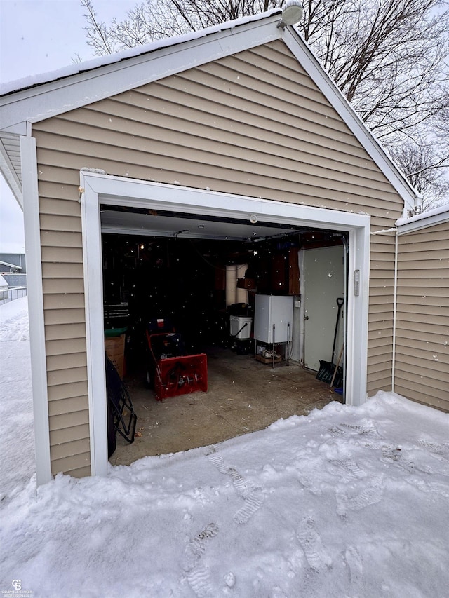 view of snow covered garage