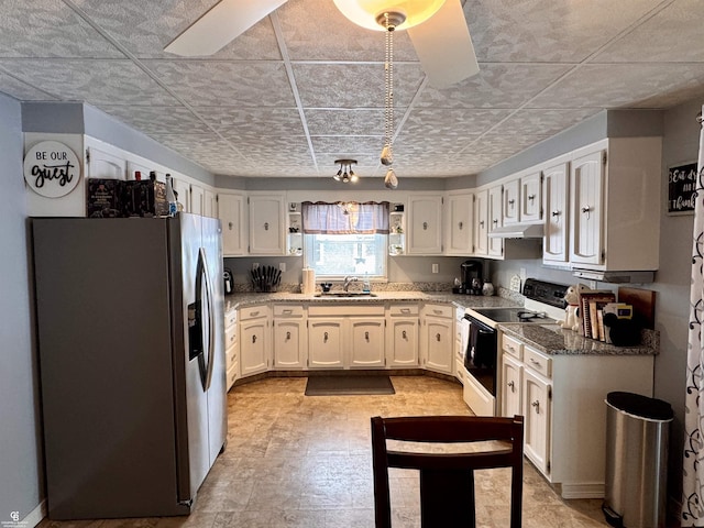 kitchen featuring range with electric cooktop, sink, white cabinets, and stainless steel fridge with ice dispenser