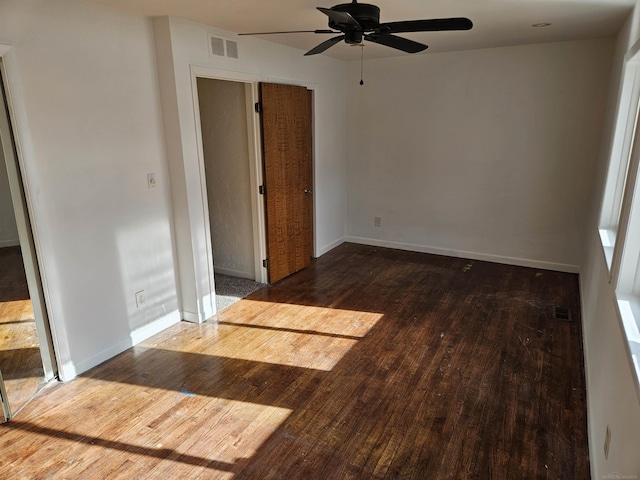 unfurnished room featuring hardwood / wood-style floors and ceiling fan