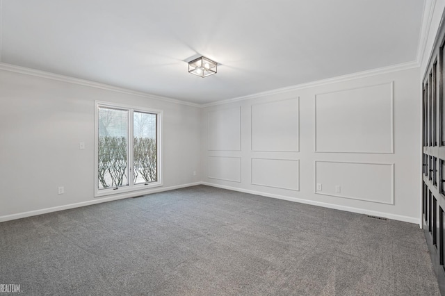 unfurnished room featuring ornamental molding and dark carpet