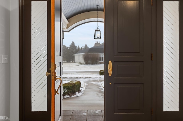 entryway with vaulted ceiling