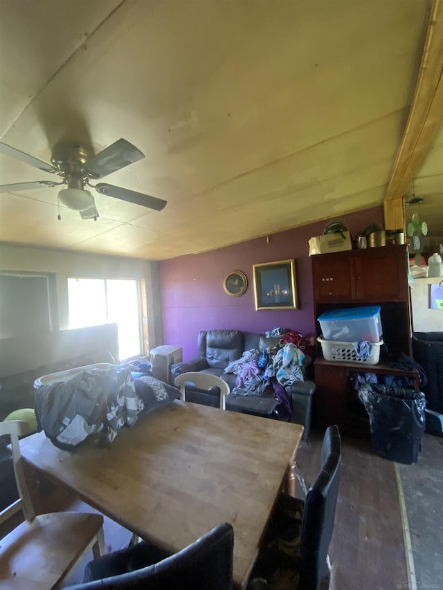 dining room featuring hardwood / wood-style flooring, ceiling fan, and lofted ceiling