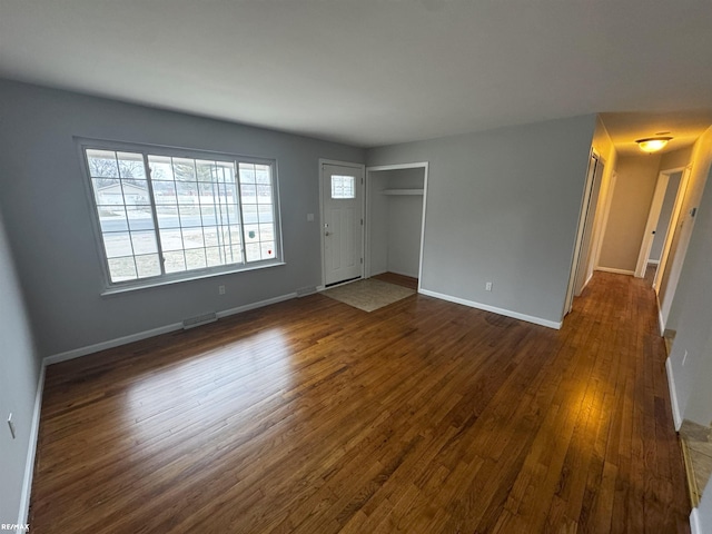 interior space with dark wood-type flooring