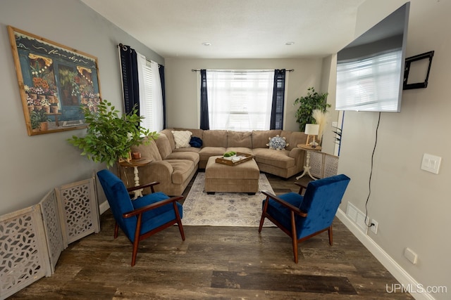 living room featuring dark hardwood / wood-style floors