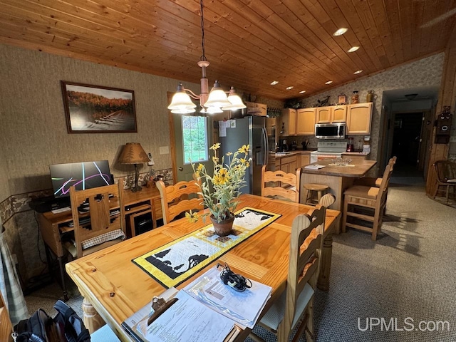 carpeted dining space with a notable chandelier, vaulted ceiling, and wooden ceiling