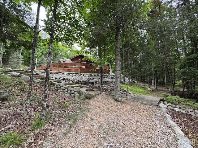 view of yard with a deck