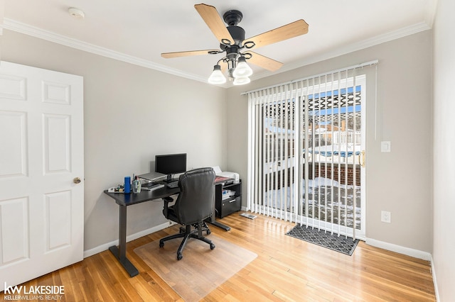 office featuring ornamental molding, hardwood / wood-style floors, and ceiling fan