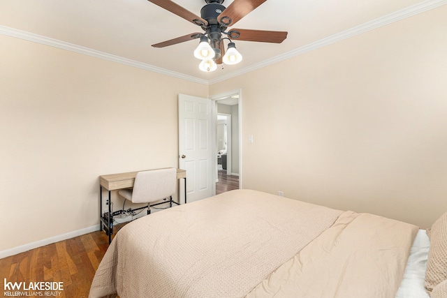 bedroom with crown molding, hardwood / wood-style flooring, and ceiling fan